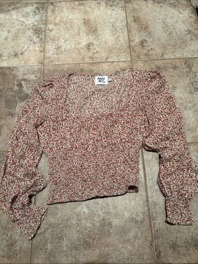cream and red floral smocked long sleeve